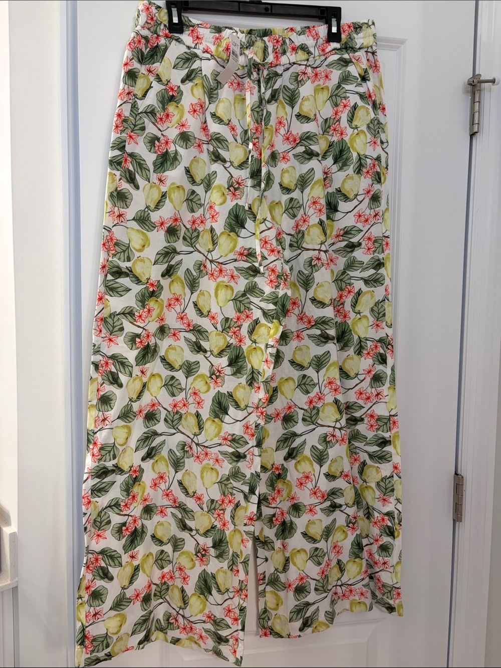 LOFT White flare pants with pear & Green Leaf Print